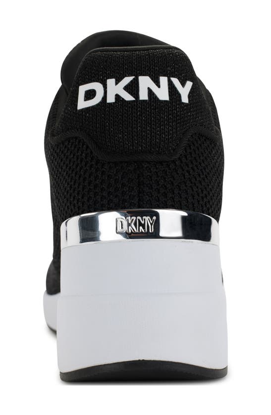 Shop Dkny Wedge Sneaker In Black