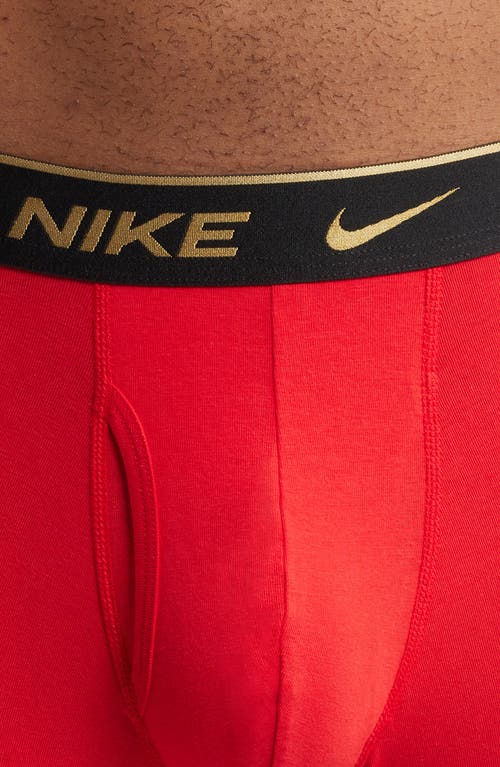 Shop Nike Dri-fit Essential Assorted 3-pack Stretch Cotton Boxer Briefs In Black-silver/red/black-gold