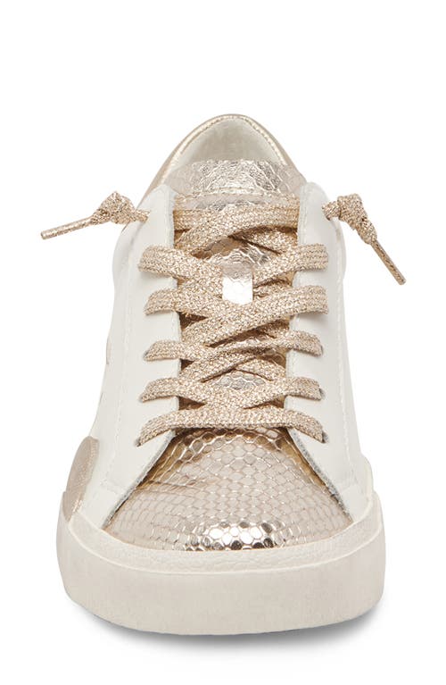 Shop Dolce Vita Zina Sneaker In White/gold Leather