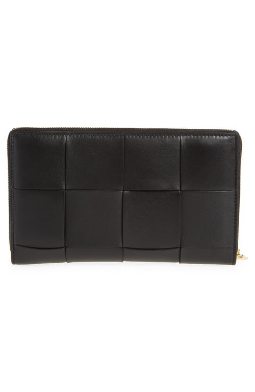 Shop Bottega Veneta Intrecciato Leather Continental Wallet In Black/gold