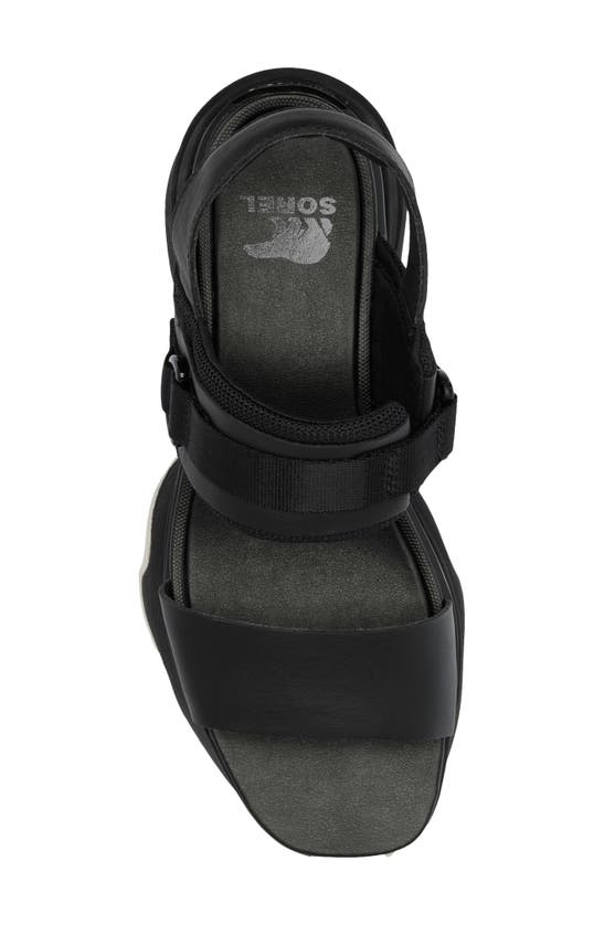 Shop Sorel Kinetic Impact Slingback Sandal In Black/ Black