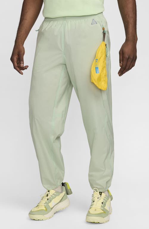 Shop Nike Acg Trail Snacks Storm-fit Adv Pants In Vapor Green/reflective Silver