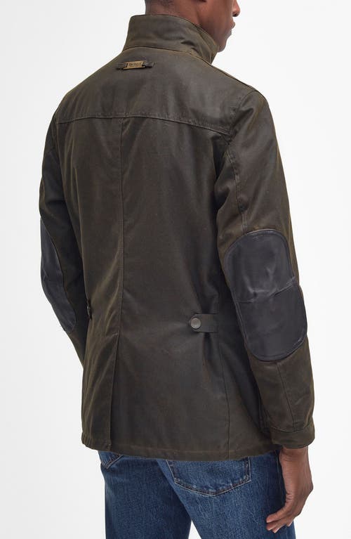 Shop Barbour Ogston Water Resistant Waxed Cotton Jacket With Removable Quilted Bib In Olive