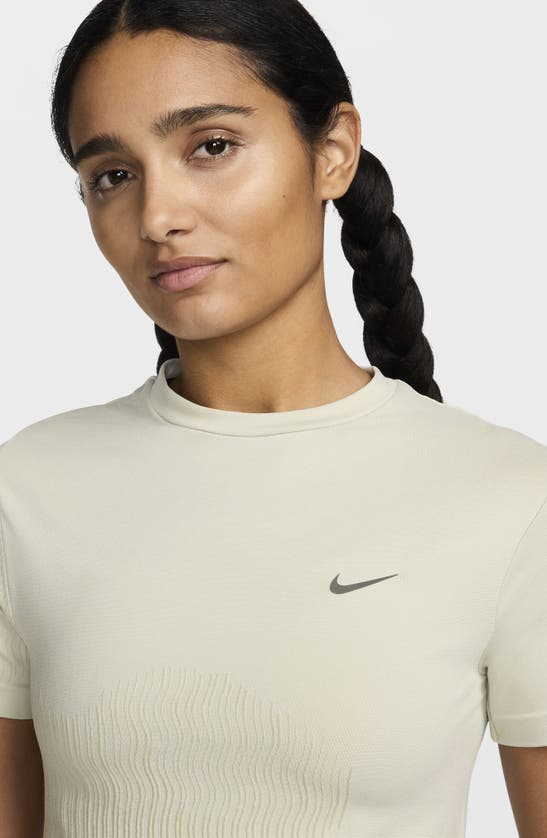 Shop Nike Running Division Dri-fit T-shirt In Barely Green/olive Aura
