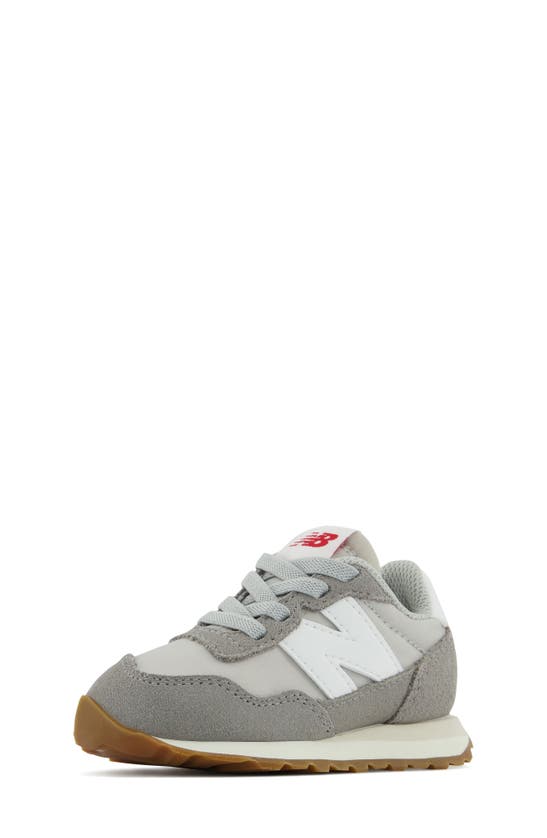 Shop New Balance Kids' 237 Sneaker In Grey
