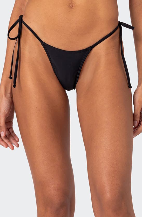 Shop Edikted Elora Side Tie Bikini Bottoms In Black