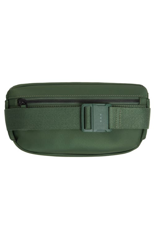 Shop Monos Metro Sling Bag In Juniper Green