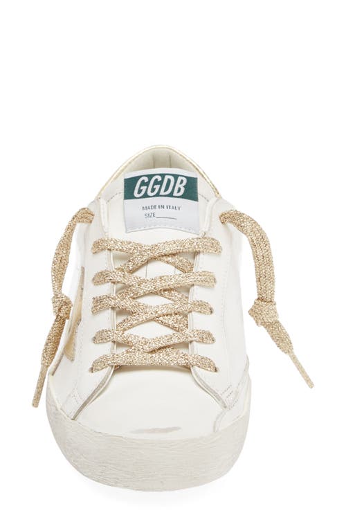 Shop Golden Goose Super-star Low Top Sneaker In White/gold