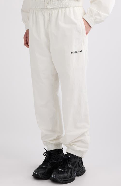 Shop Balenciaga Backward Logo Cotton Blend Track Pants In White