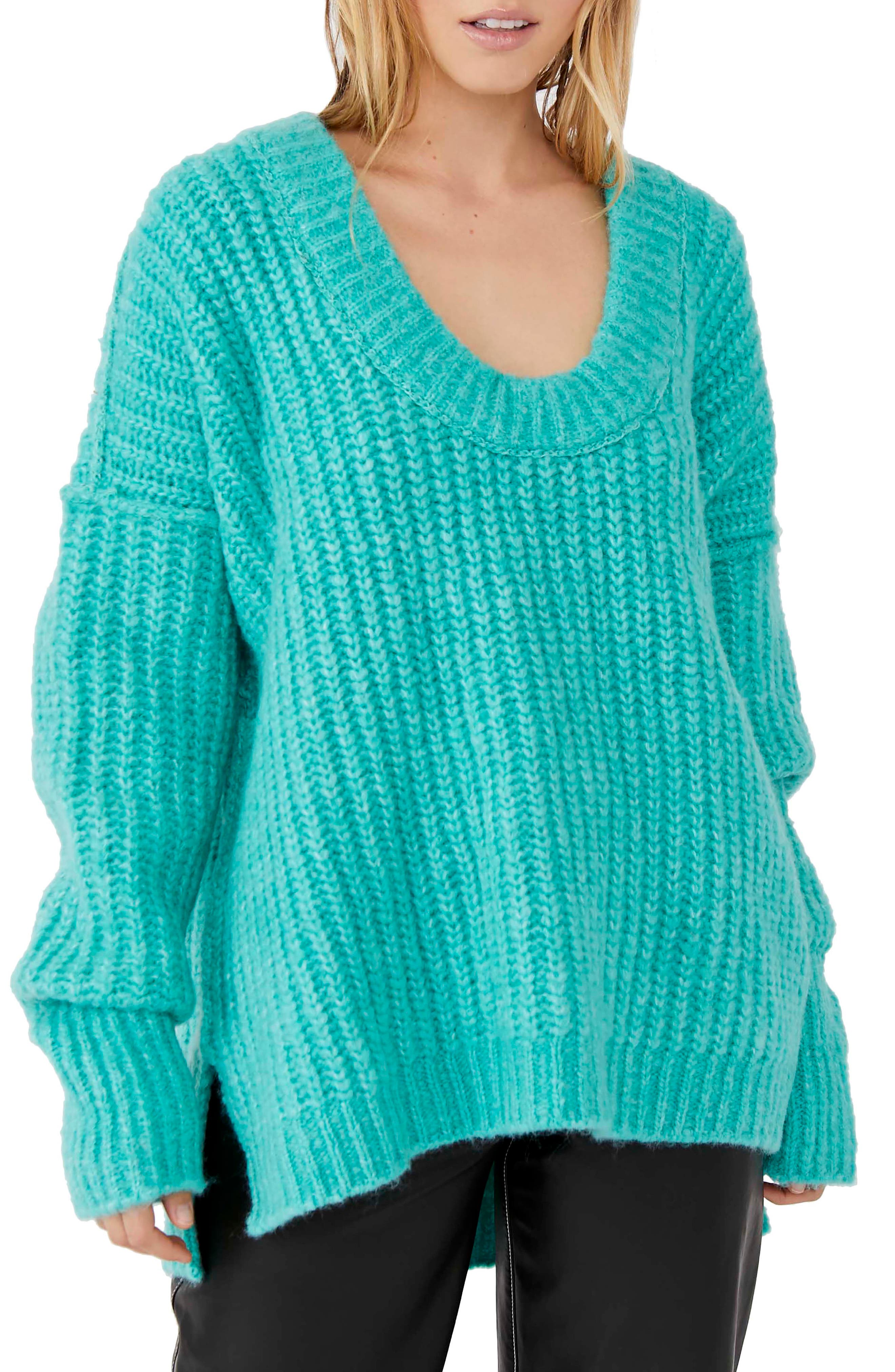 teal sweaters