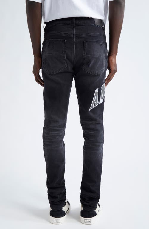 Shop Amiri Varsity Logo Rip & Repair Skinny Fit Jeans In Vintage Black