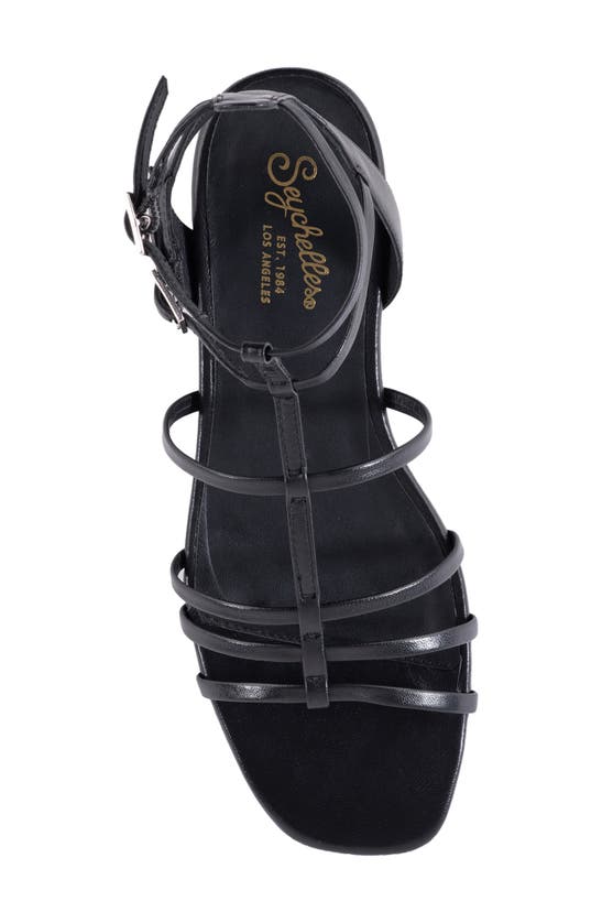 Shop Seychelles Luxurious Wedge Sandal In Black