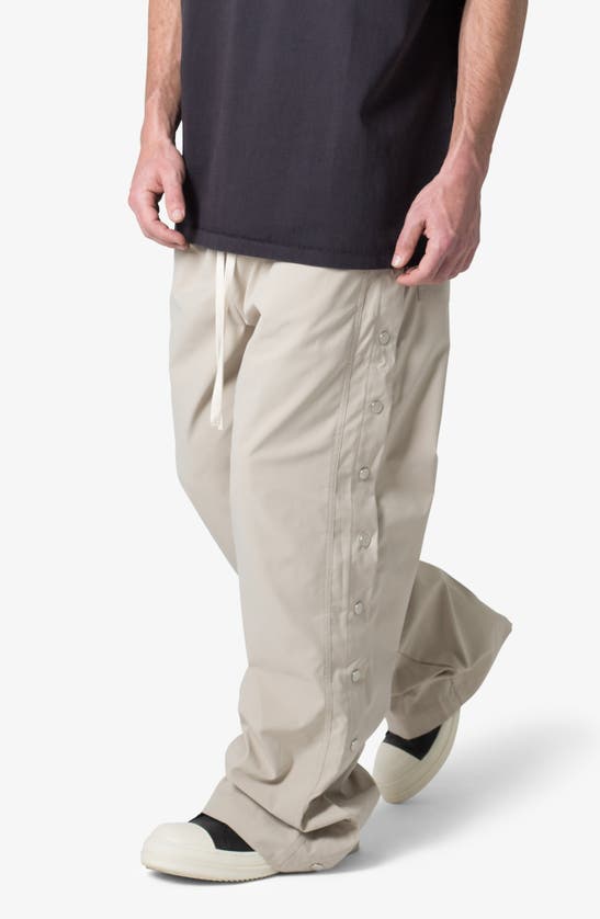 Shop Mnml Oversize Side Snap Nylon Pants In Tan