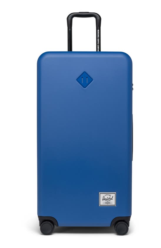 Shop Herschel Supply Co Heritage™ Hardshell Large Luggage In True Blue