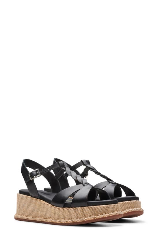 Shop Clarks (r) Kimmei Twisted Ankle Strap Platform Wedge Sandal In Black Leather