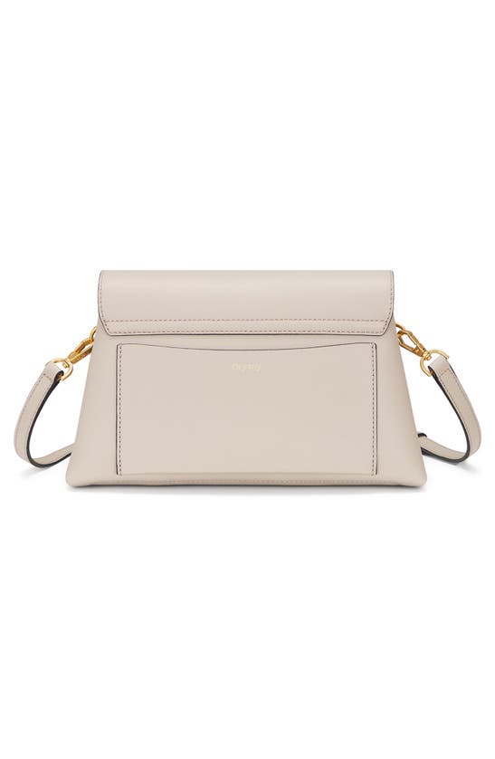 Shop Oryany Lottie Flap Crossbody Bag In Cream