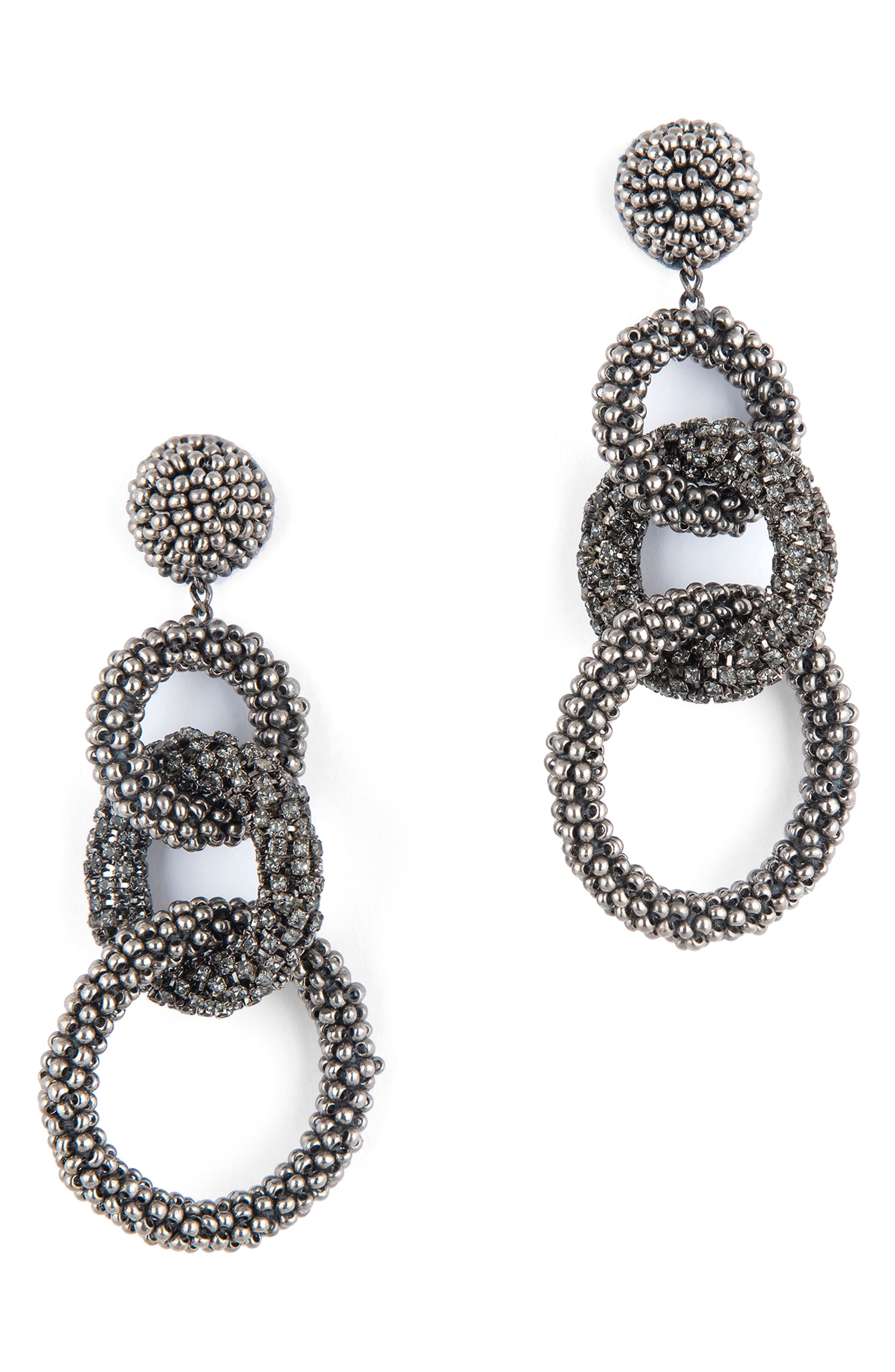 grey statement earrings