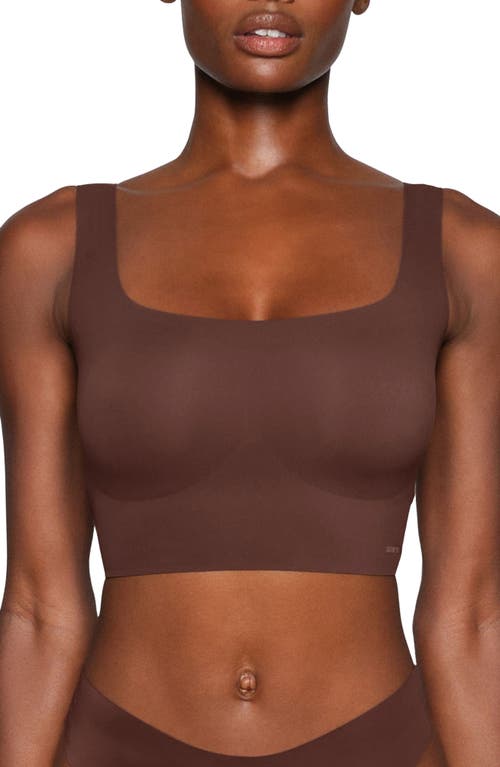 Shop Skims Naked Wireless Scoop Longline Bra In Cocoa