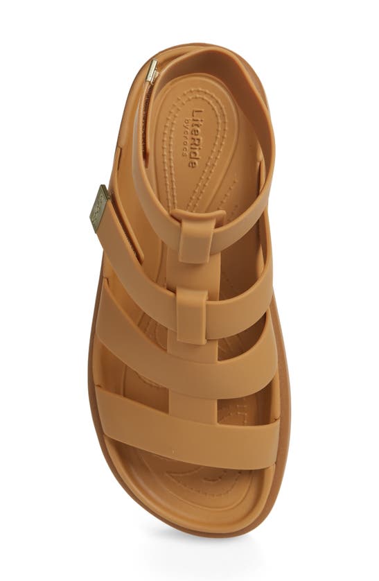 Shop Crocs Brooklyn Luxe Water Resistant Gladiator Fisherman Slide Sandal In Tan/ Tan