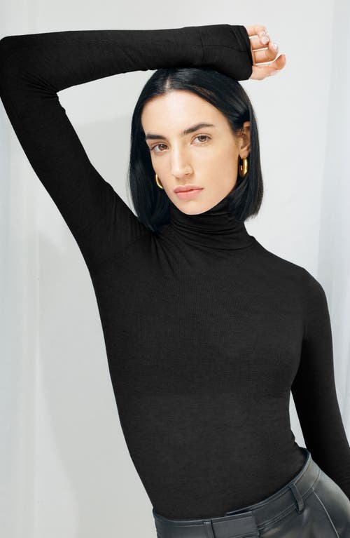 Marcella Eloise Turtleneck Semisheer Jersey Top In Black