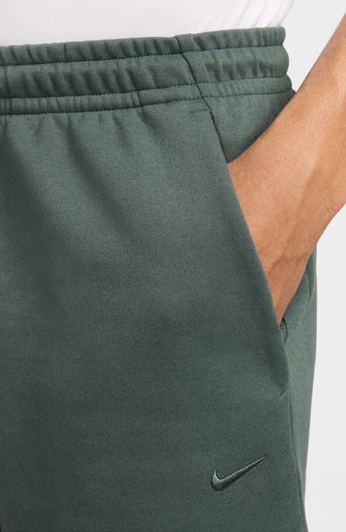 Shop Nike Primary Dri-fit Unlined Shorts In Vintage Green/vintage Green