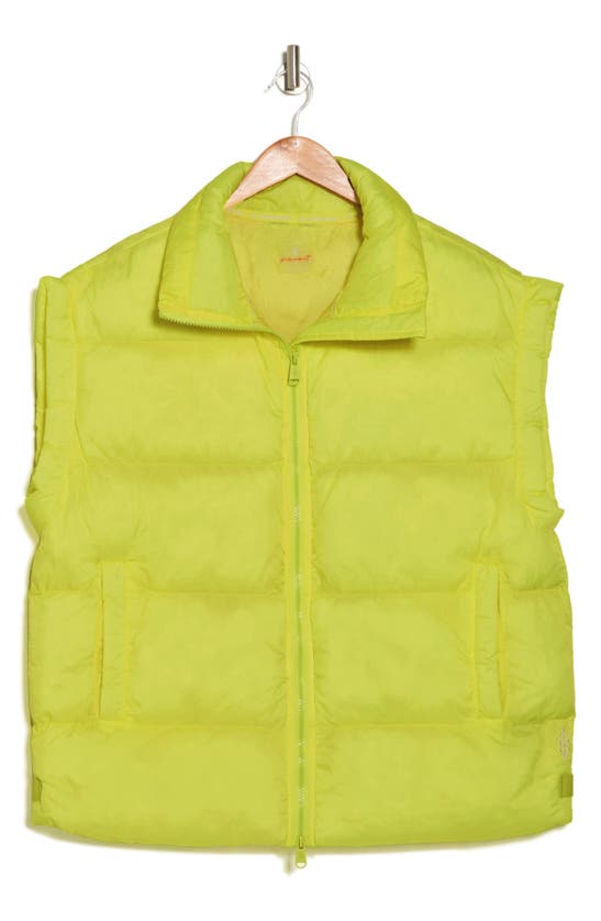 Shop Fp Movement By Free People In A Bubble Oversize Puffer Vest In Sour Citrus