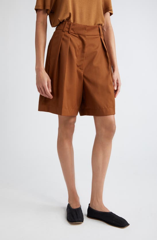 Shop Rohe Pleated Wide Leg Virgin Wool Shorts In Rust