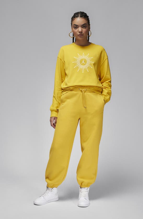Shop Jordan Flight Heiress Of Optimism Long Sleeve Oversize Cotton T-shirt In Yellow Ochre/ Sail