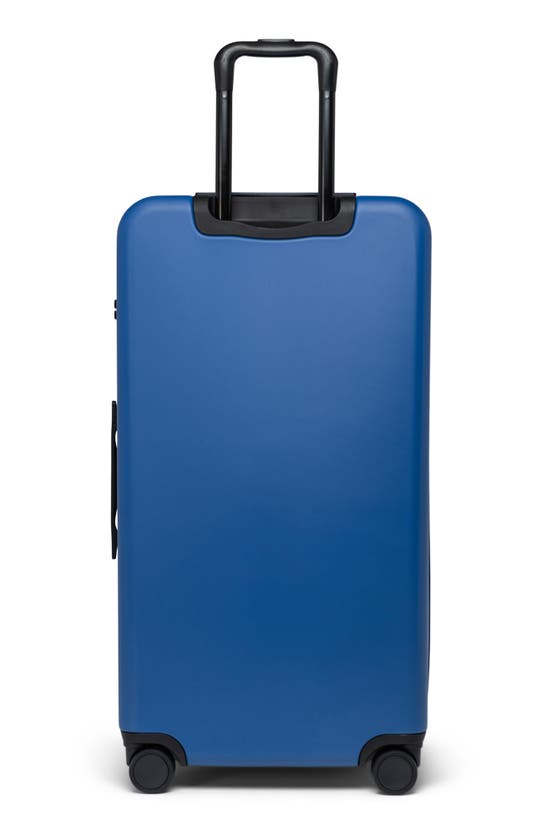 Shop Herschel Supply Co . Heritage™ Hardshell Large Luggage In True Blue