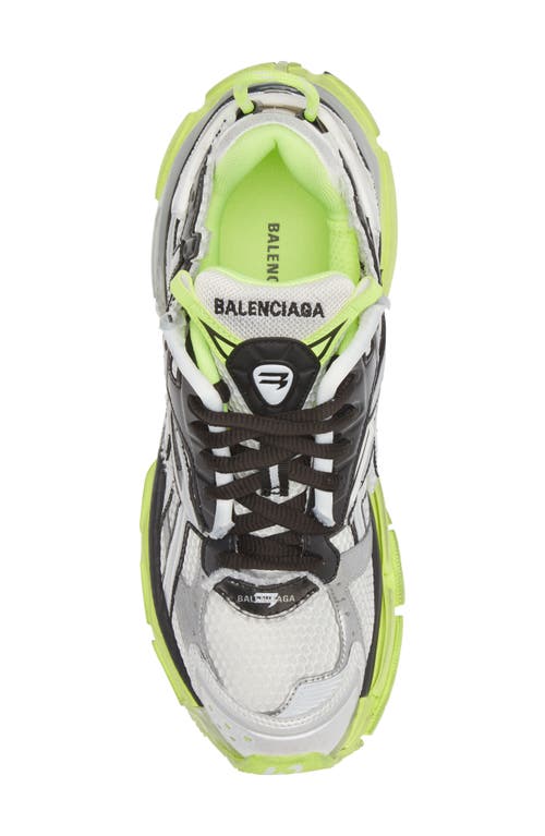 Shop Balenciaga Runner Sneaker In White/black/yellow