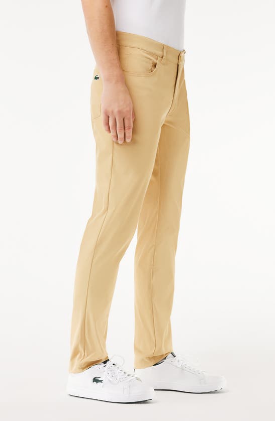 Shop Lacoste Slim Fit Performance Golf Pants In Croissant