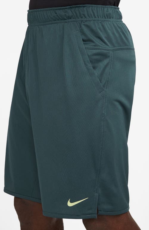 Shop Nike Dri-fit Totality Unlined Shorts In Deep Jungle/black/green