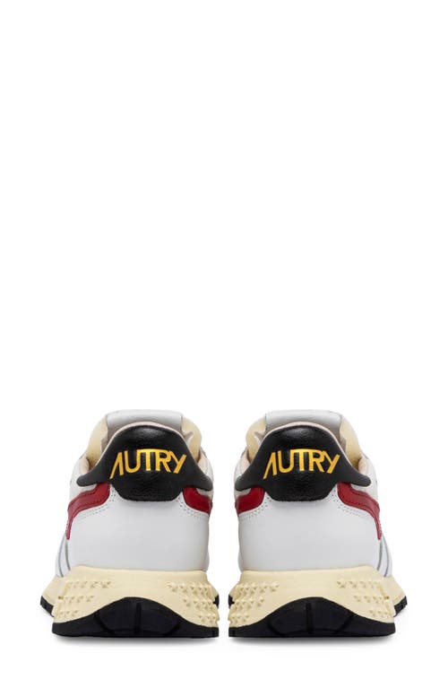 Shop Autry Reelwind Low Water Resistant Sneaker In White/red