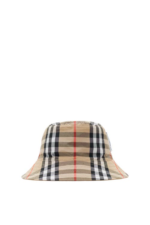 Shop Burberry Reversible Cotton Bucket Hat In Sand