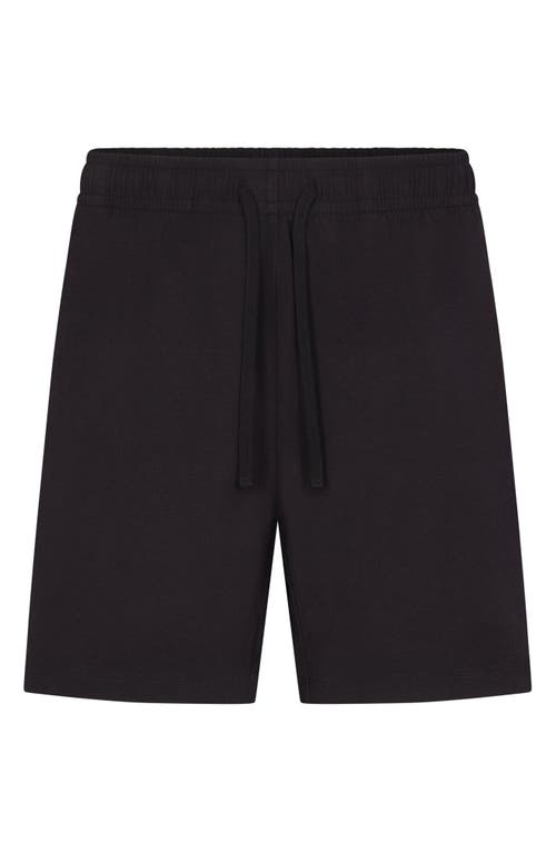 Shop Skims Stretch Cotton Blend Jersey Lounge Shorts In Obsidian