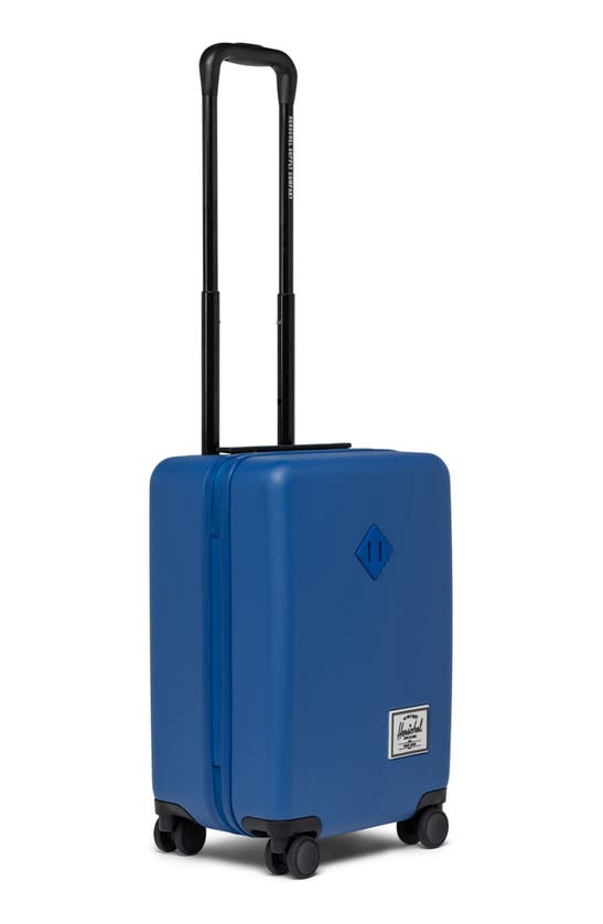 Shop Herschel Supply Co Heritage™ Hardshell Carry-on Luggage In True Blue