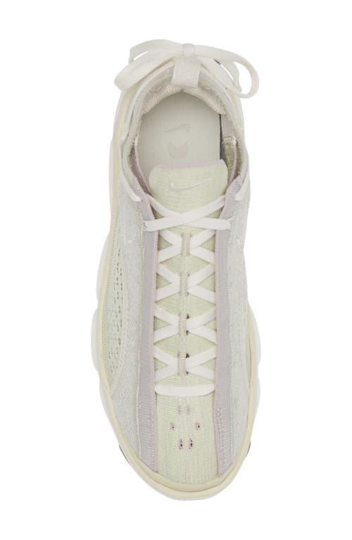 Shop Nike Flyknit Bloom Sneaker In Light Bone/sail/phantom