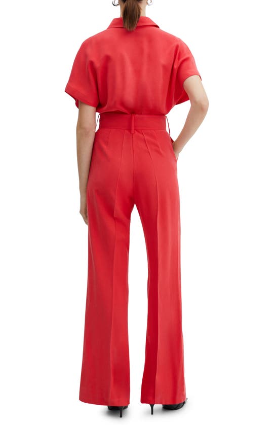 Shop Mango Belted Flare Leg Jumpsuit In Coral Red