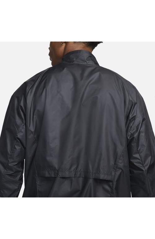 Shop Nike Storm-fit Track Club Woven Running Jacket In Black/midnight Navy/white