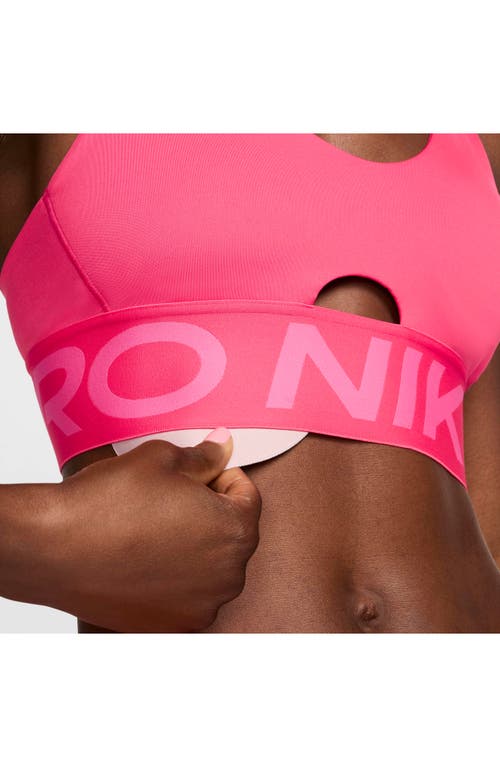 Shop Nike Pro Indy Dri-fit Sports Bra In Aster Pink/pinksicle/white