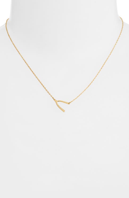 Shop Jennifer Zeuner Lily Wishbone Necklace In Yellow Gold