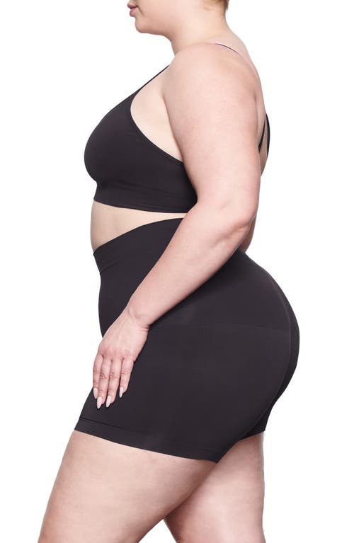 Shop Skims Soft Smoothing Seamless Shorts In Onyx