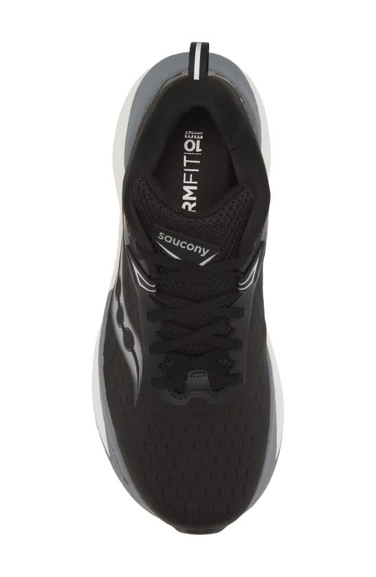 Shop Saucony Triumph 22 Running Shoe In Black/ White