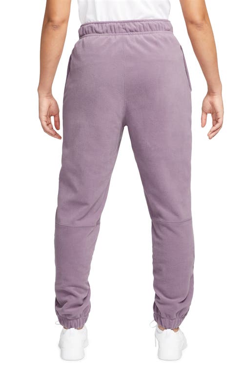 Shop Nike Therma-fit Pants In Violet Dust/pale Ivory