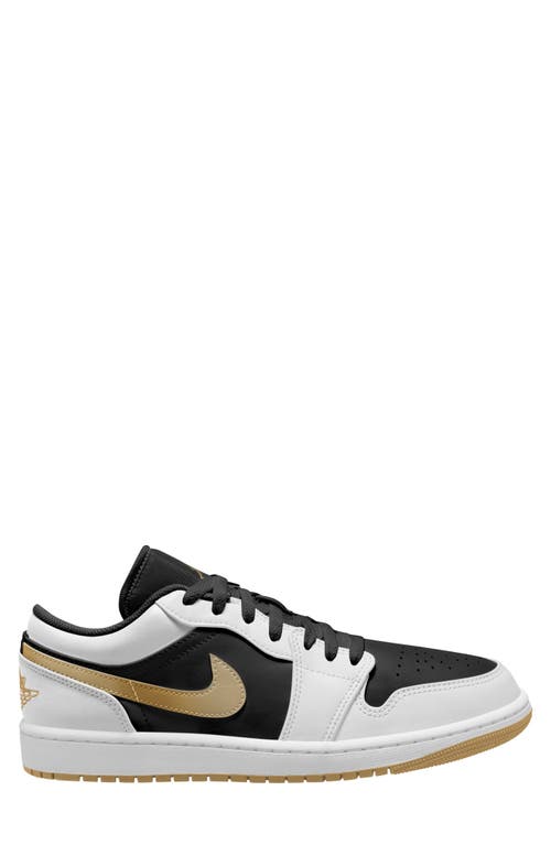 Shop Jordan Air  1 Low Sneaker In White/metallic Gold/black