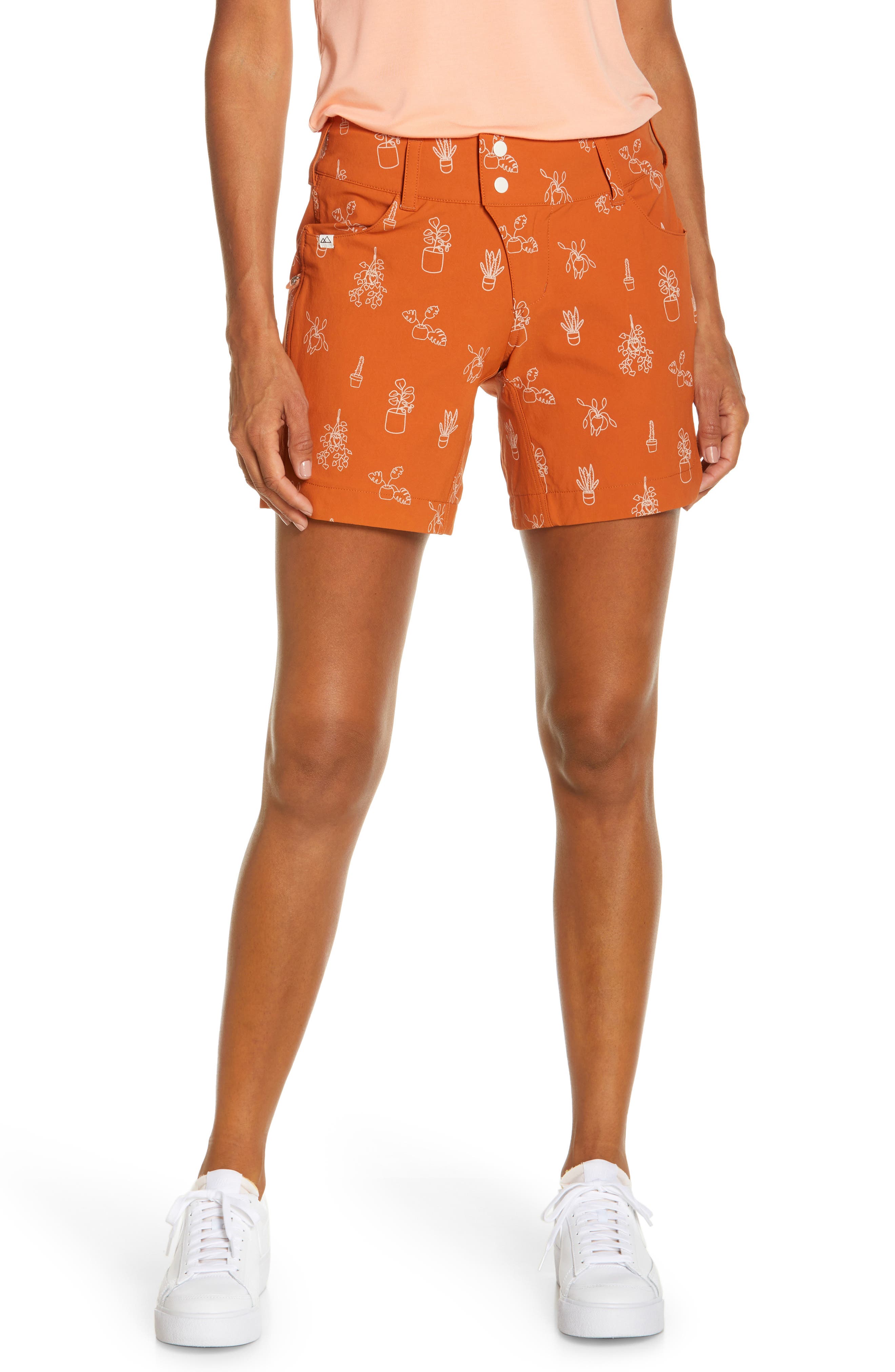 orange print shorts