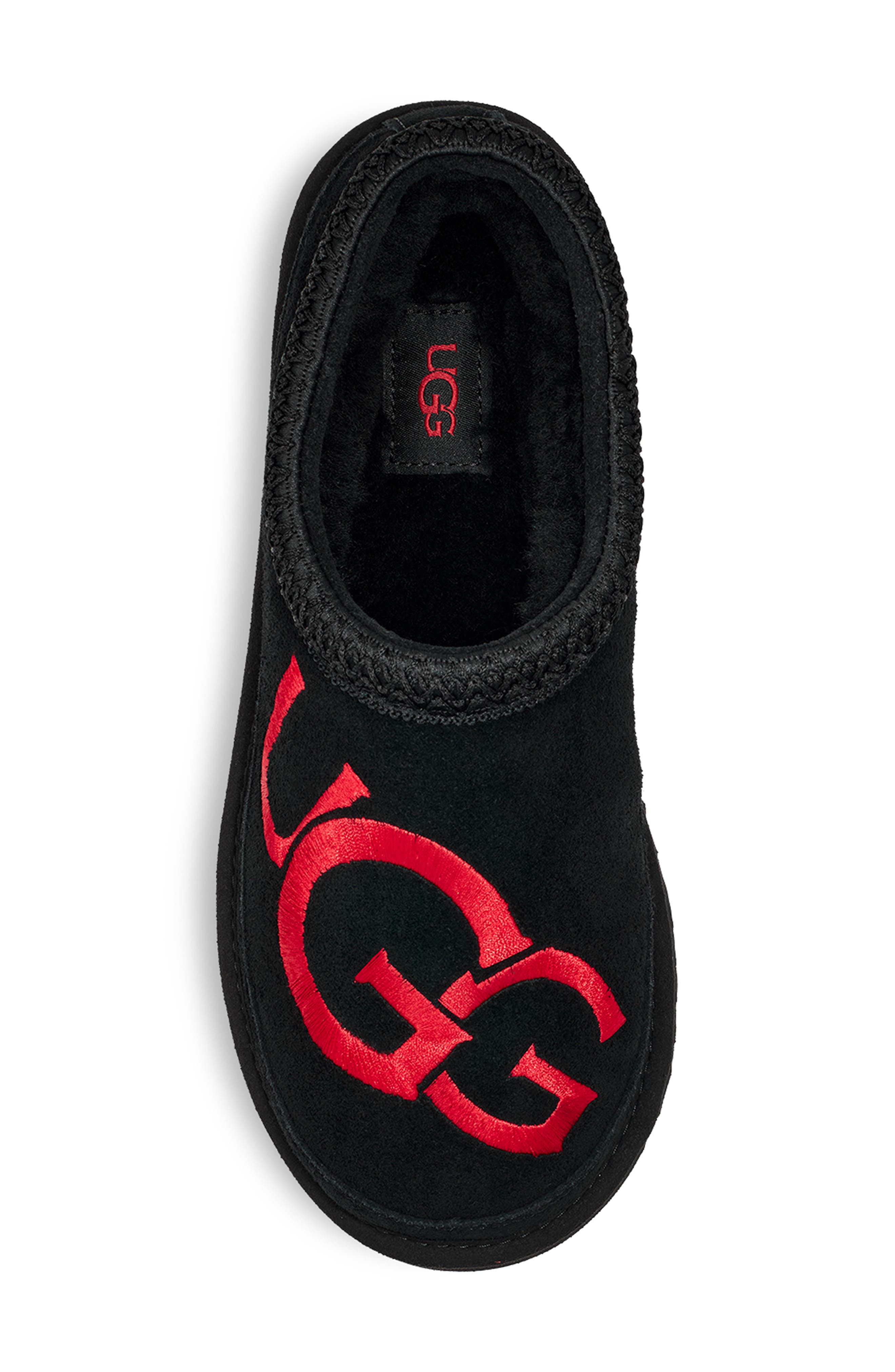 tasman logo black and red