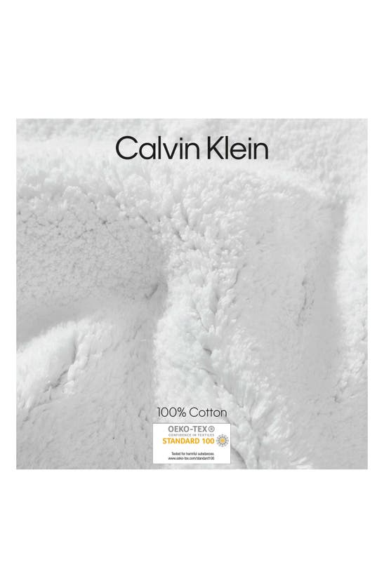 Shop Calvin Klein Essence 2-piece Tufted Bath Mat Set In White