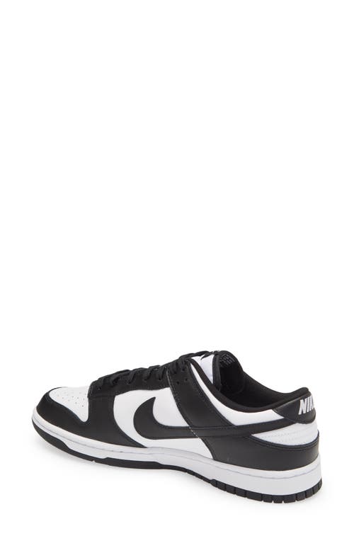 Shop Nike Dunk Low Retro Basketball Sneaker In White/black/white