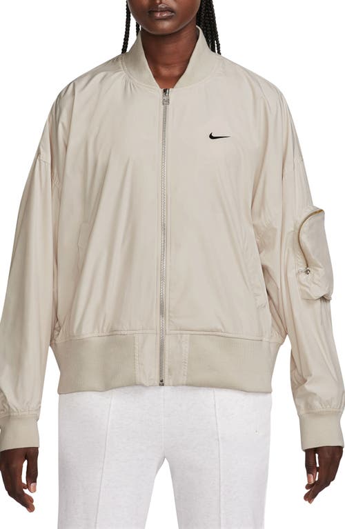 Shop Nike Sportswear Essentials Oversize Bomber Jacket In Light Orewood Brown/black